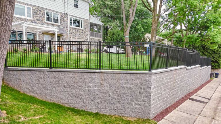 Completed retaining wall with new grass