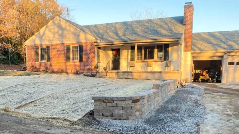 Retaining wall along drive