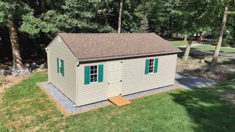 Stone base foundation with shed