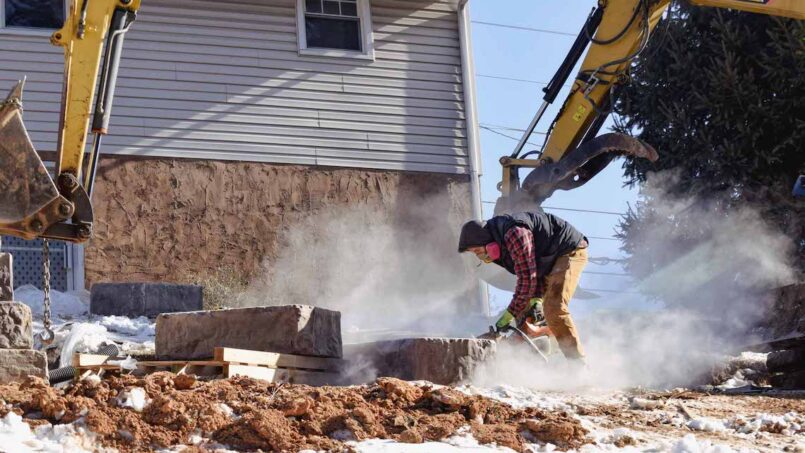 Two-Tiered Rosetta Grand Ledge Retaining Wall 5 Cutting the stone
