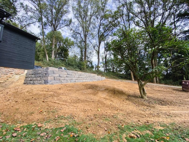 The steep slope in the front yard