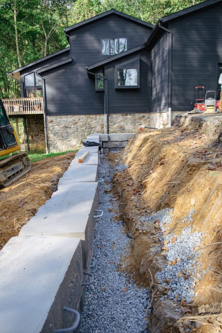 Build process photo of BedRock Siteworks' Grand Ledge Retaining Wall.