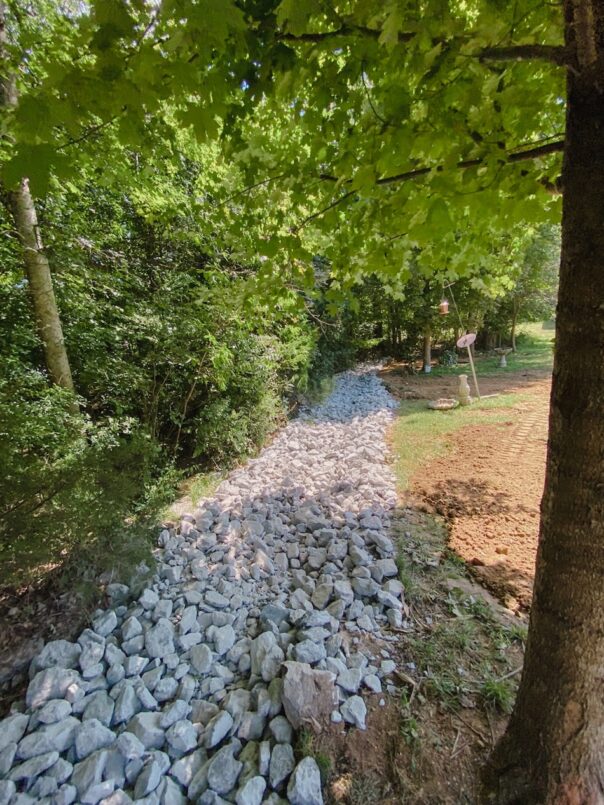 The dry creek bed is being installed